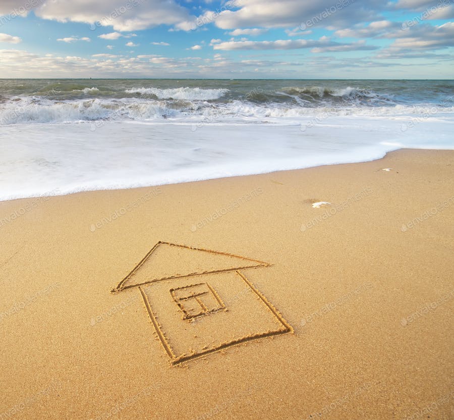 عکس نقاشی خانه در شن های ساحل