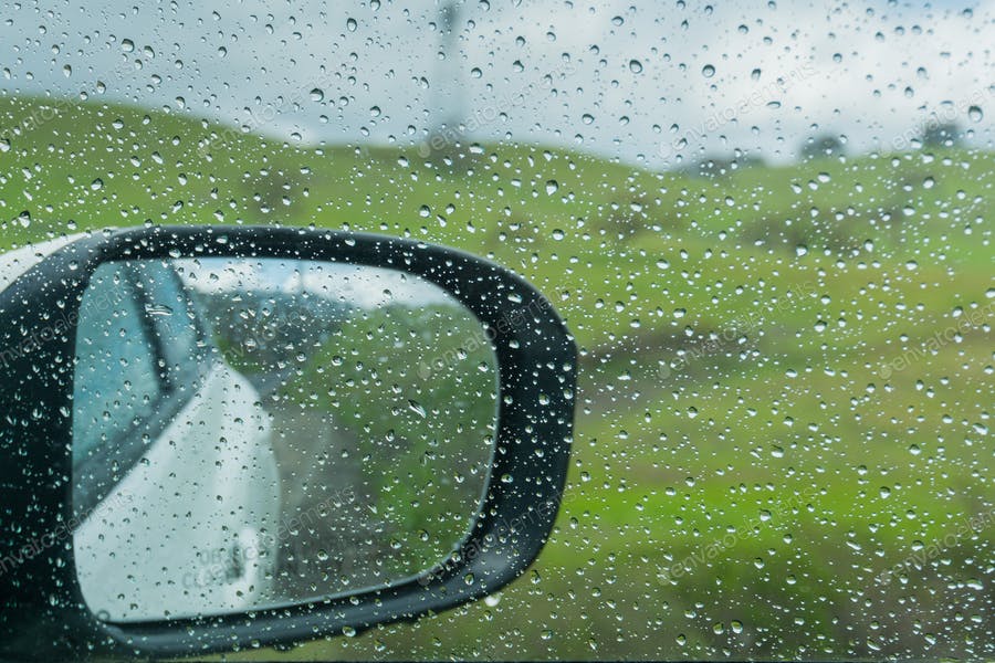عکس قطره های باران روی شیشه ماشین